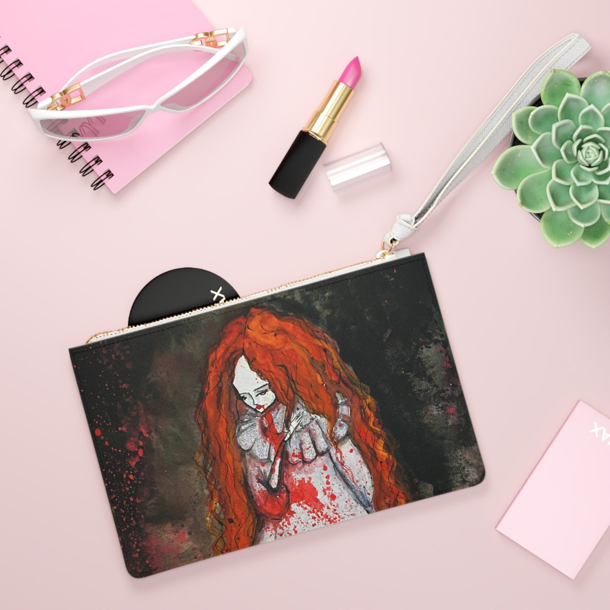 Lucy · Clutch Bag