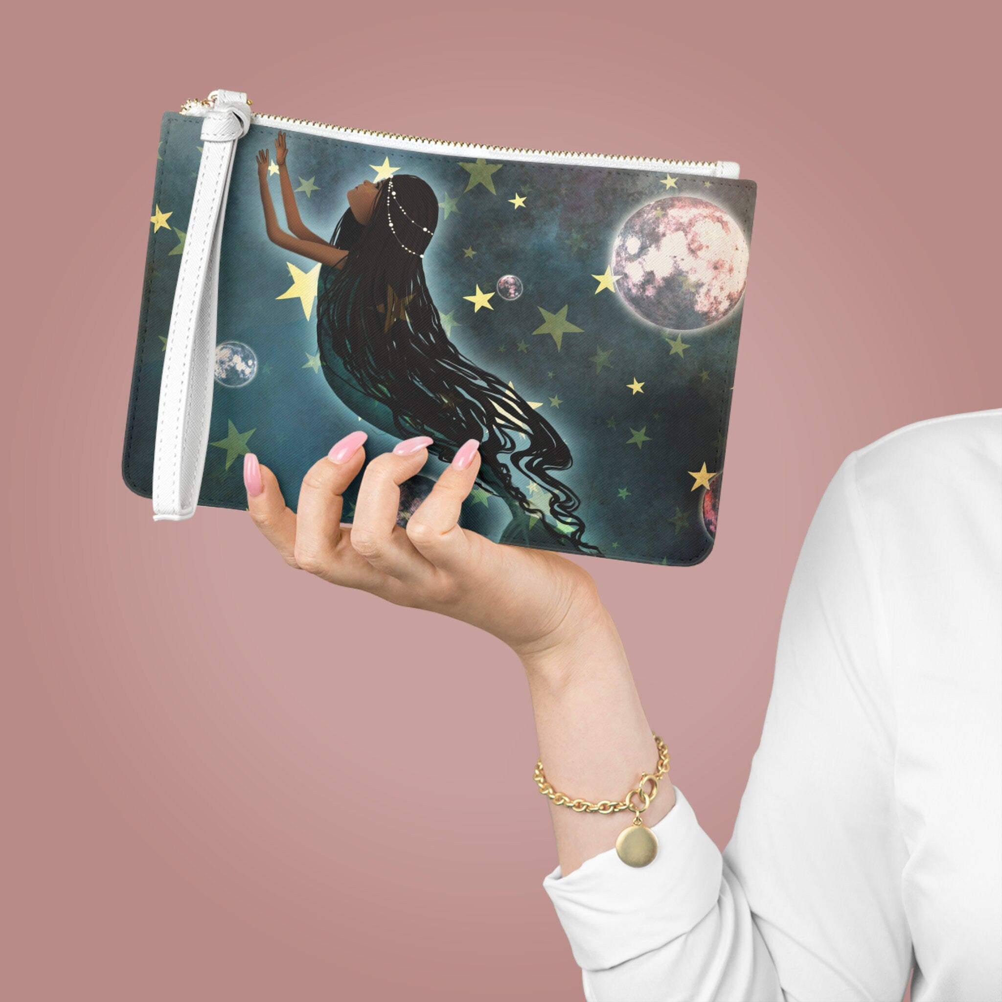 Daughter of the sky mermaid · Clutch Bag