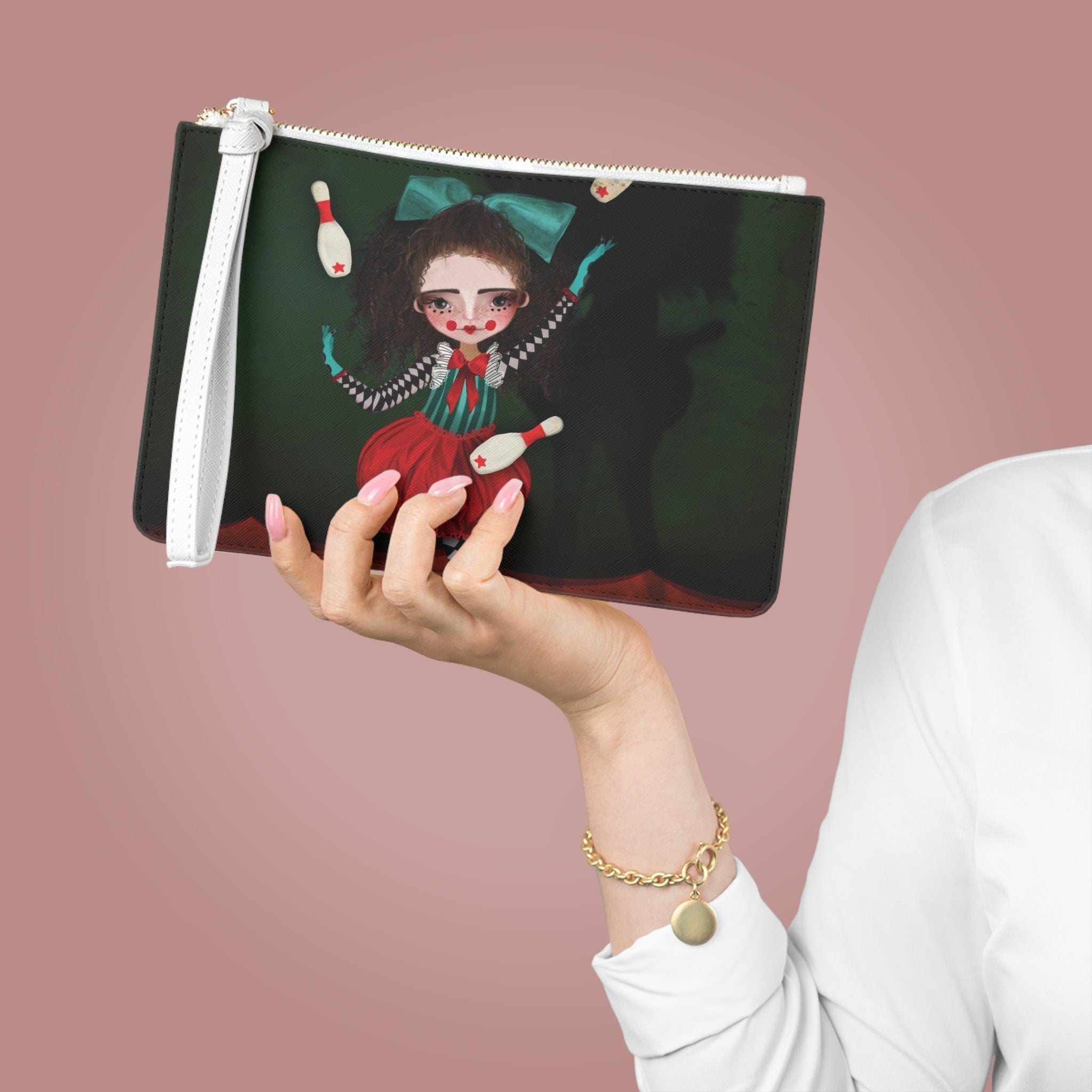 Le jongleur · Clutch Bag